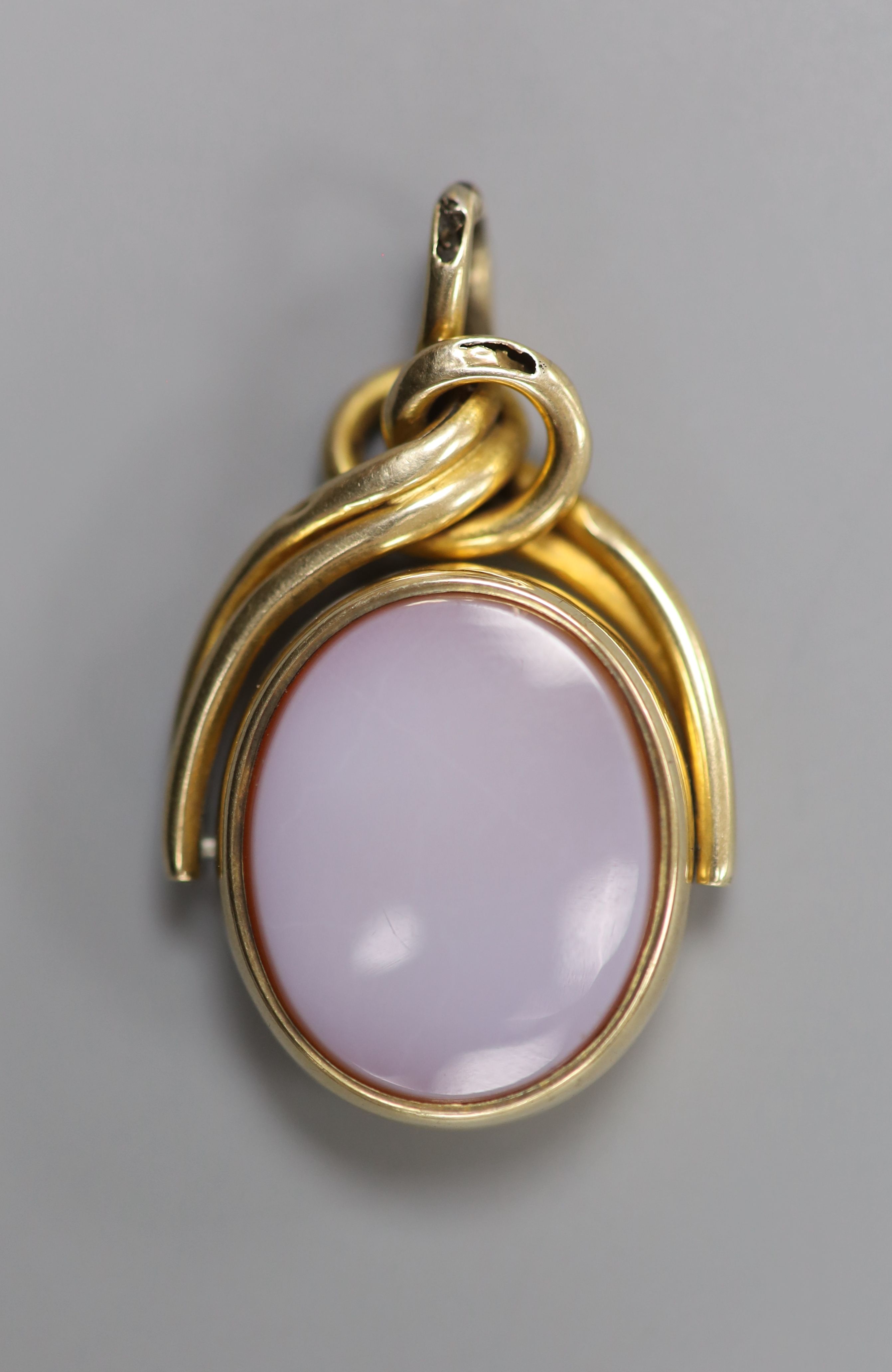 A yellow metal, bloodstone and sardonyx set swivelling fob seal